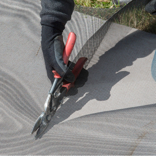 Fire mesh being cut for deck or vulnerable-area protection