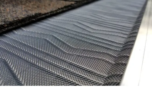 Close-up of gutter guard mesh
